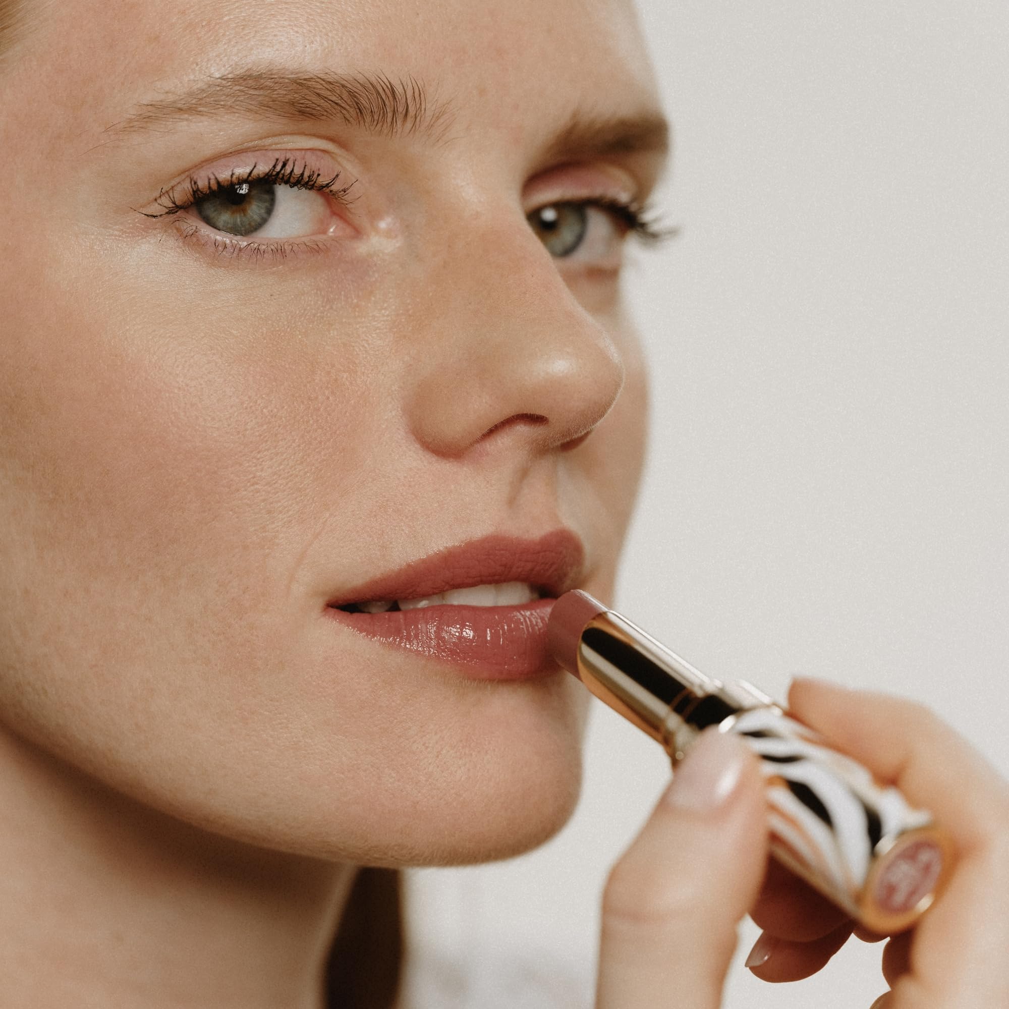 Layering with Phyto-Rouge Shine for richer color without sacrificing comfort