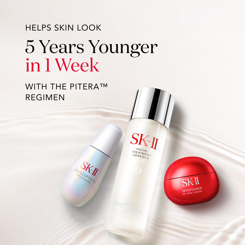 SK-II bottle displayed on a bathroom vanity with soft lighting.