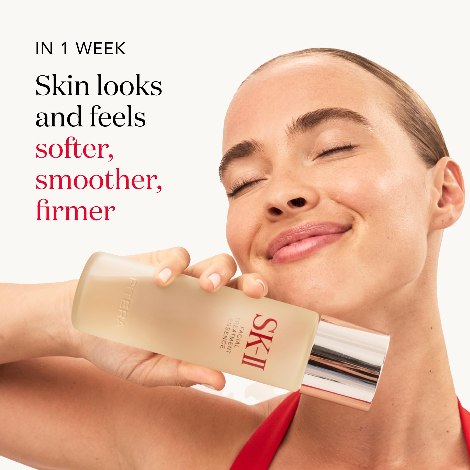 Patting SK-II Facial Treatment Essence onto the face to even texture and glow.