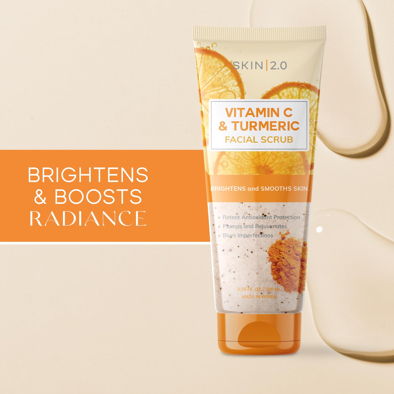 Skin 2.0 Vitamin C & Turmeric Scrub texture closeup with gentle exfoliating grains.
