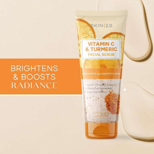 Skin 2.0 Vitamin C & Turmeric Scrub texture closeup with gentle exfoliating grains.