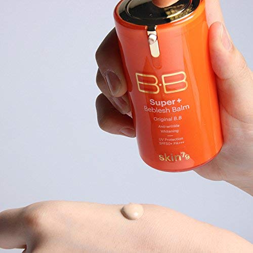 SKIN79 Orange BB Cream swirl on skin demonstrating seamless blending and brightness