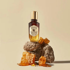 SKINFOOD 1957 Royal Honey Propolis Enrich Essence texture on hand; immediate hydration.