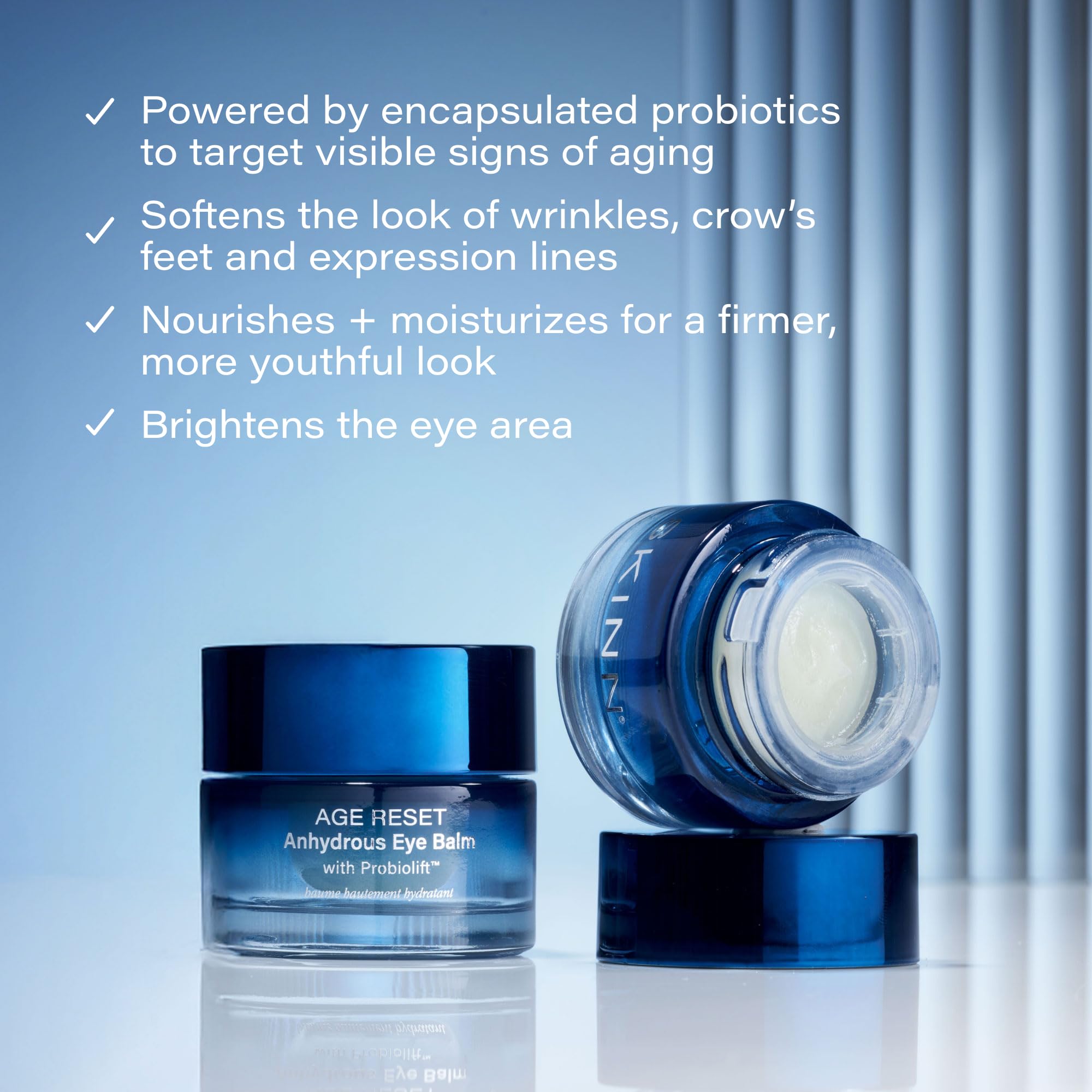 Applying SKINN Age Reset around the eye area with gentle patting