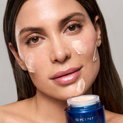 Vitamin C and peptides in SKINN Age Reset for brightness.