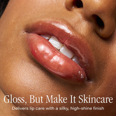 SKINN Luminous Crimson Lip Oil packaging closeup highlights travel friendly bottle and premium feel
