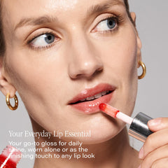 SKINN Luminous Crimson Lip Oil swatch reveals smooth texture and glassy shine