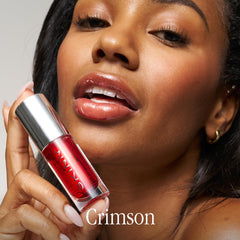 Layer over lipstick or wear alone with SKINN lip oil