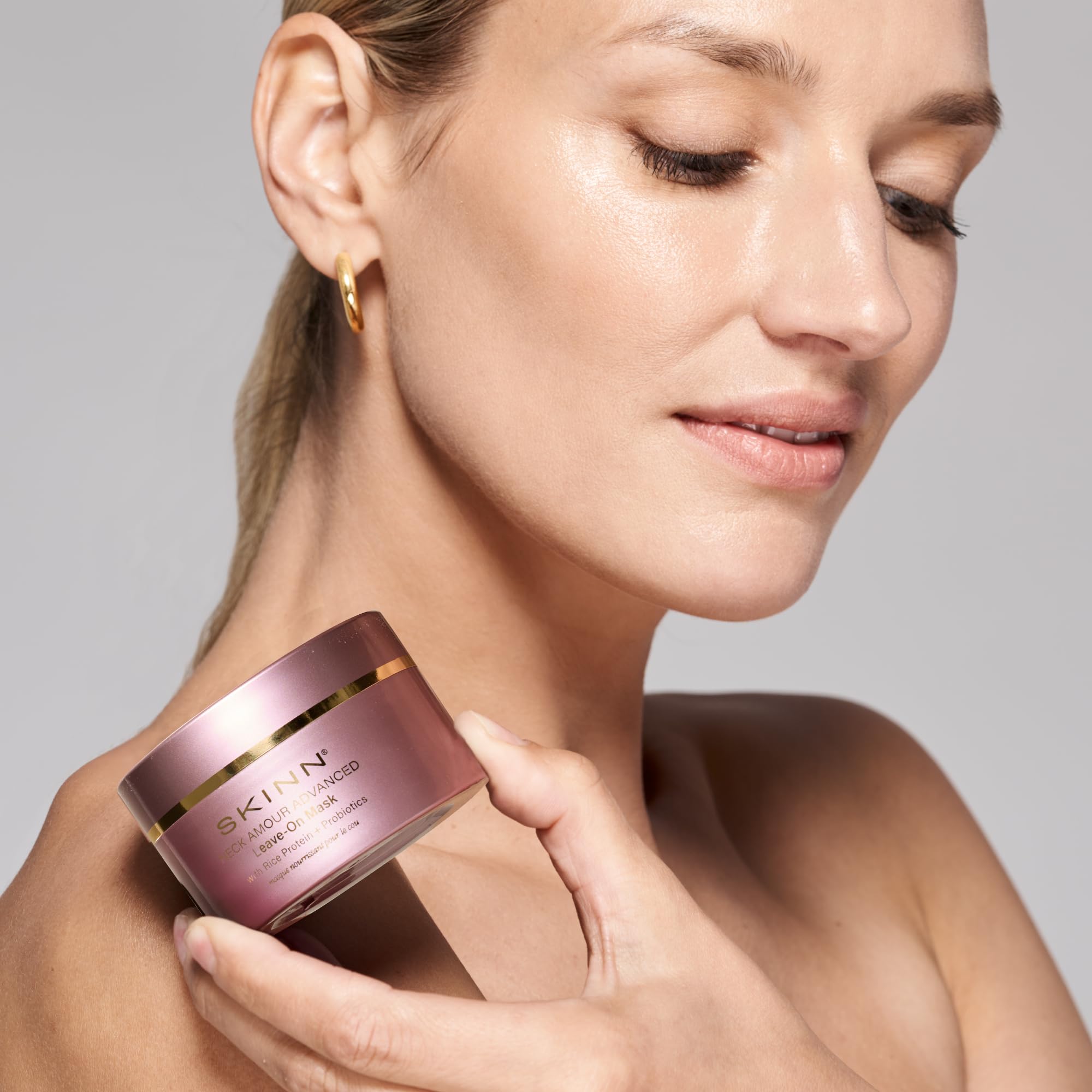 Massage motion emphasizes gentle lifting during skincare.