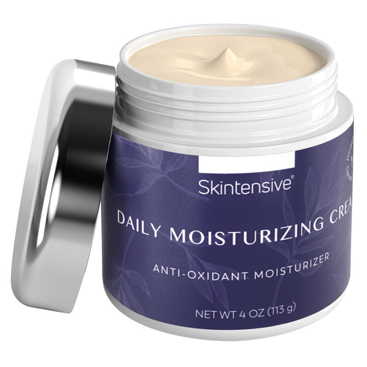 Close-up texture of SKINTENSIVE cream shows non-greasy, fast-absorbing formula.