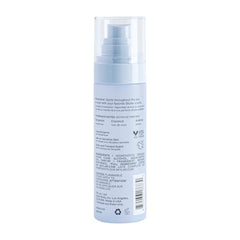 Skylar Coconut Cove spray in hand, on-the-go fragrance for travel.