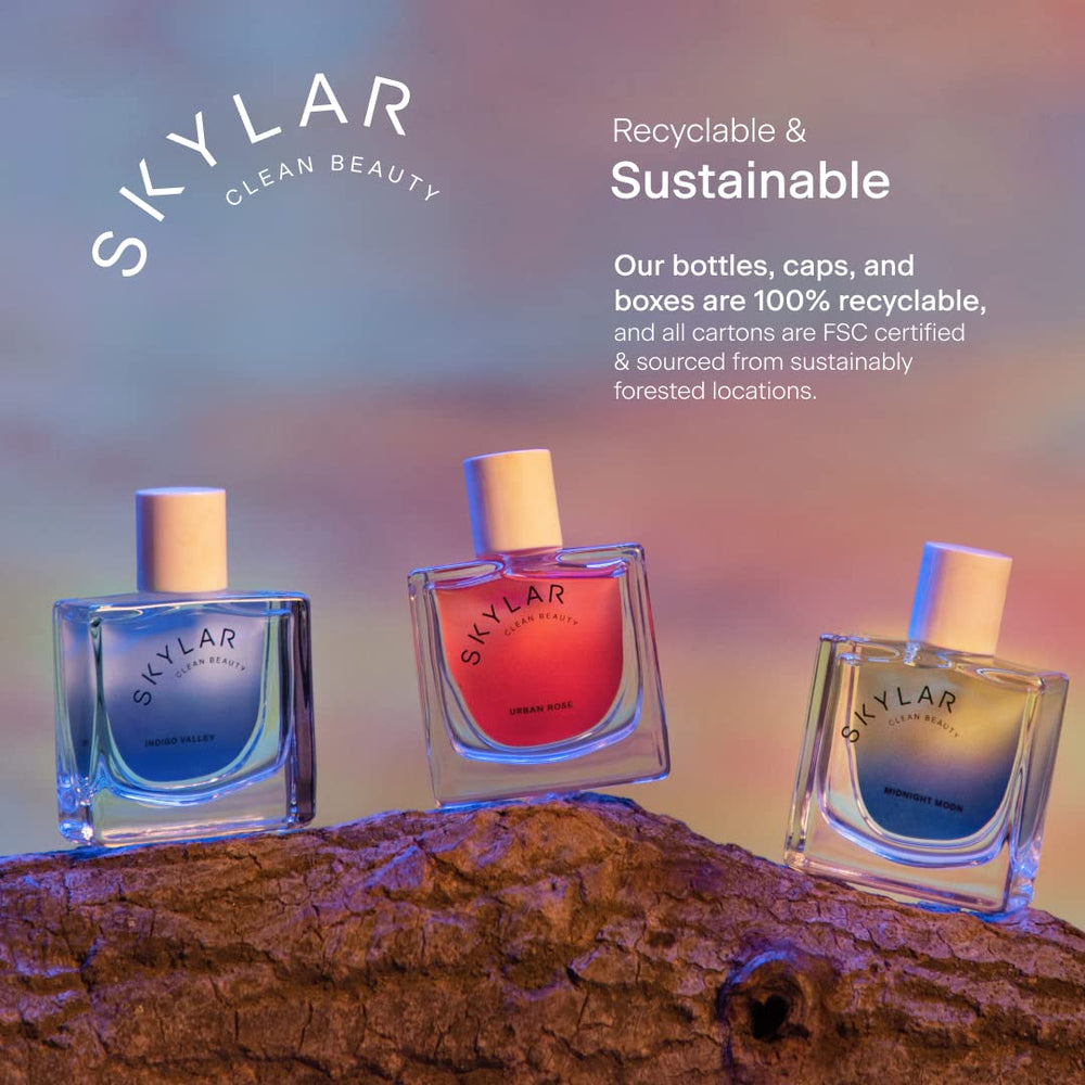 Skylar Midnight Moon base notes: Earthy woods and Vetiver.