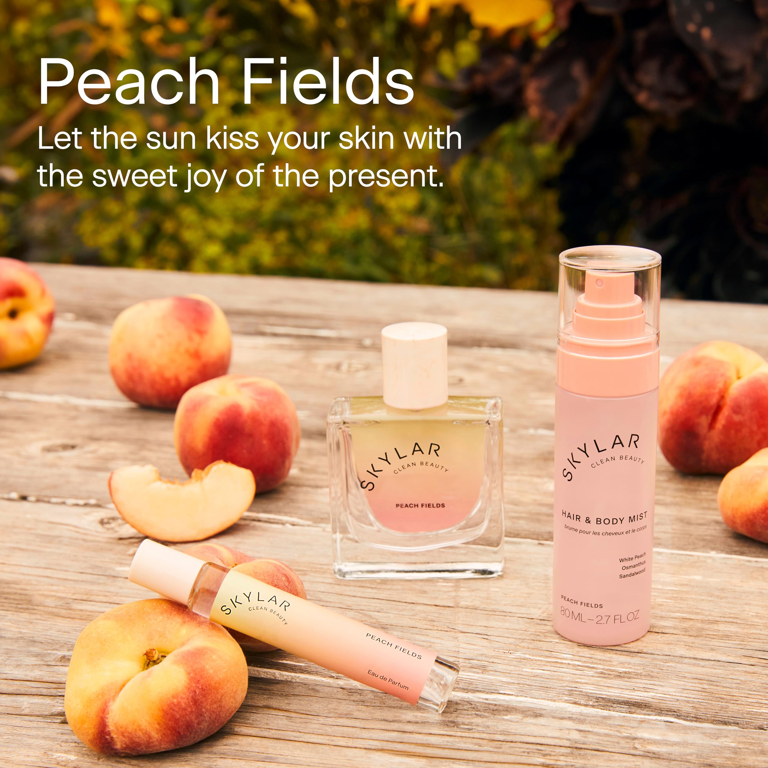 A compact 80 ml Skylar Peach Fields bottle sits with travel essentials.