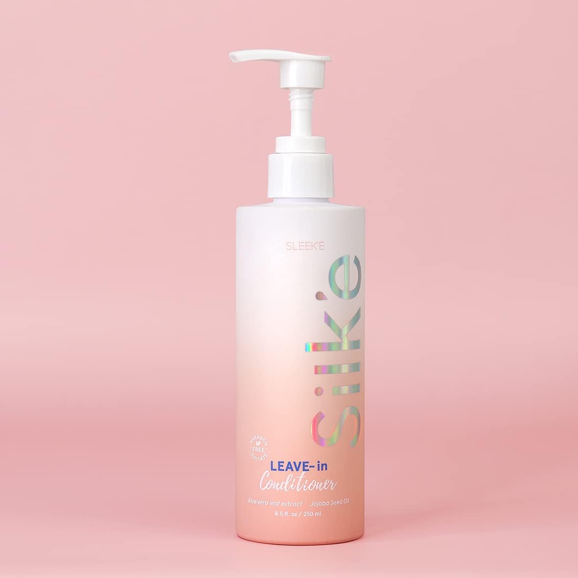 Sleek-e Silk-e Leave-In application on hair mid-lengths for smooth detangling.