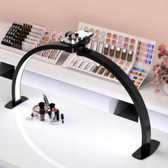SLYFTE Half Moon LED light over the nail desk delivering wide coverage for precise detail.