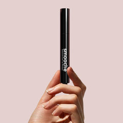 Smooche lip plumper hydration drop image emphasizes hyaluronic acid support.