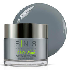 SNS Nail Dip Blue Steel bottle close reveals a shimmering gray shade for a chic look.