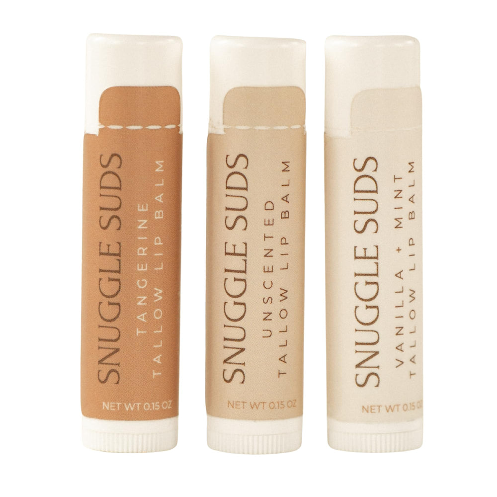 Snuggle Suds Vanilla Mint lip balm tube delivering long-lasting hydration for soft lips.