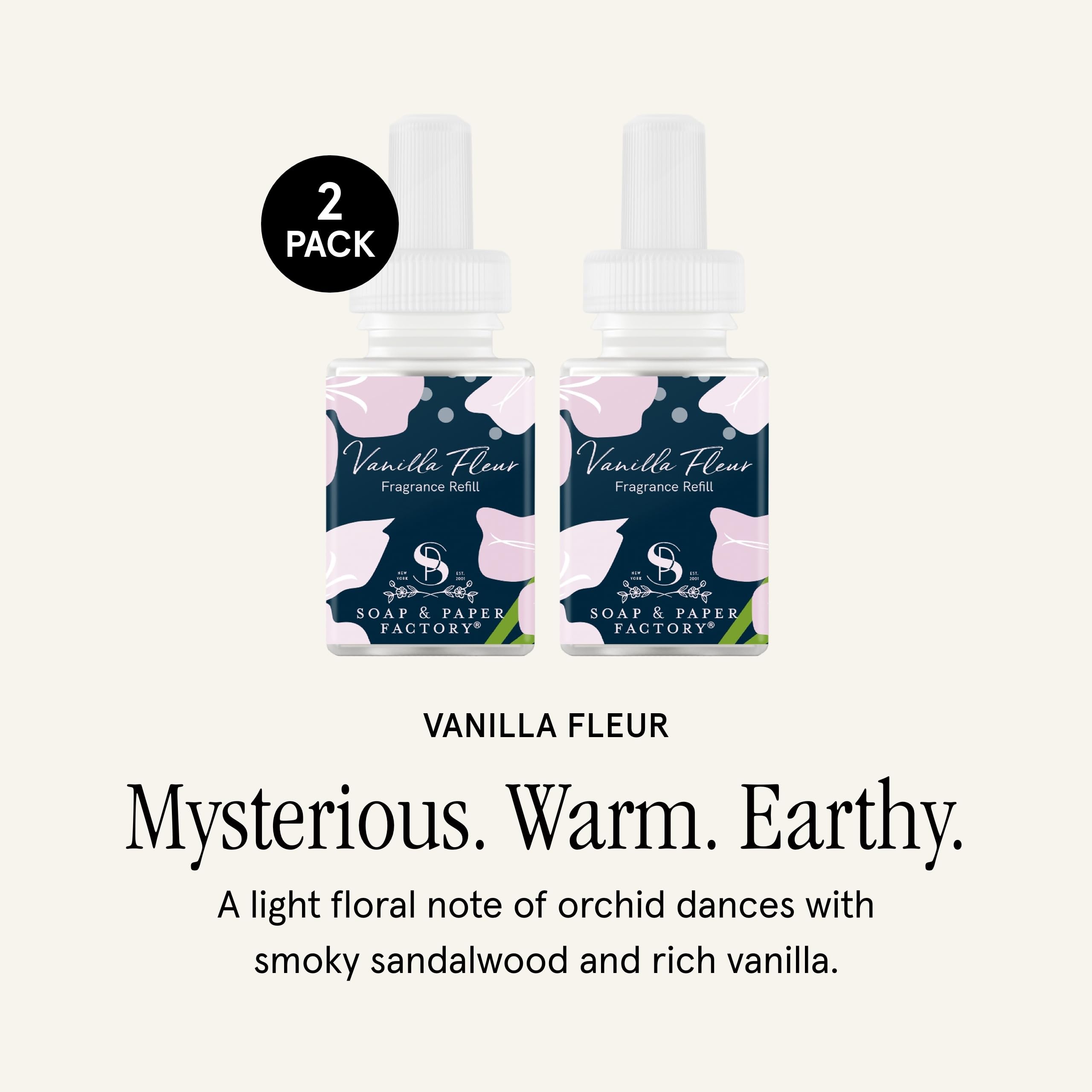 Soap Paper Factory Vanilla Fleur refill in hand enhances home aroma.