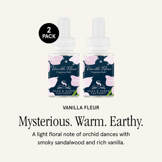 Soap Paper Factory Vanilla Fleur refill in hand enhances home aroma.