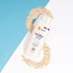 Soapbox Oat Milk Lavender bottle and foam highlighting vegan formula for everyday care