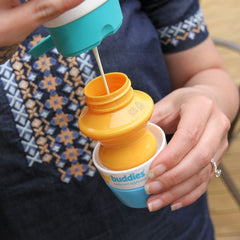 Solar Buddies Duo GB roll-on sponge applicator in-use showing quick lotion application for families