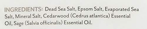 Soothing Touch Cedar Sage bath salts pouch in bath scene suggests spa-like relaxation.