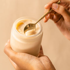 SPA CEYLON Virgin Coconut Exfoliator jar closeup highlights rich texture for gentle buffing.