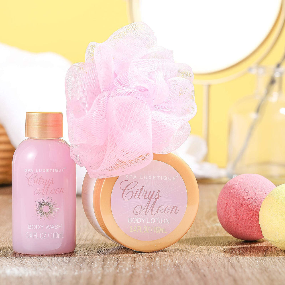 Spa Luxetique body lotion bottle nourishes skin with soft hydration.
