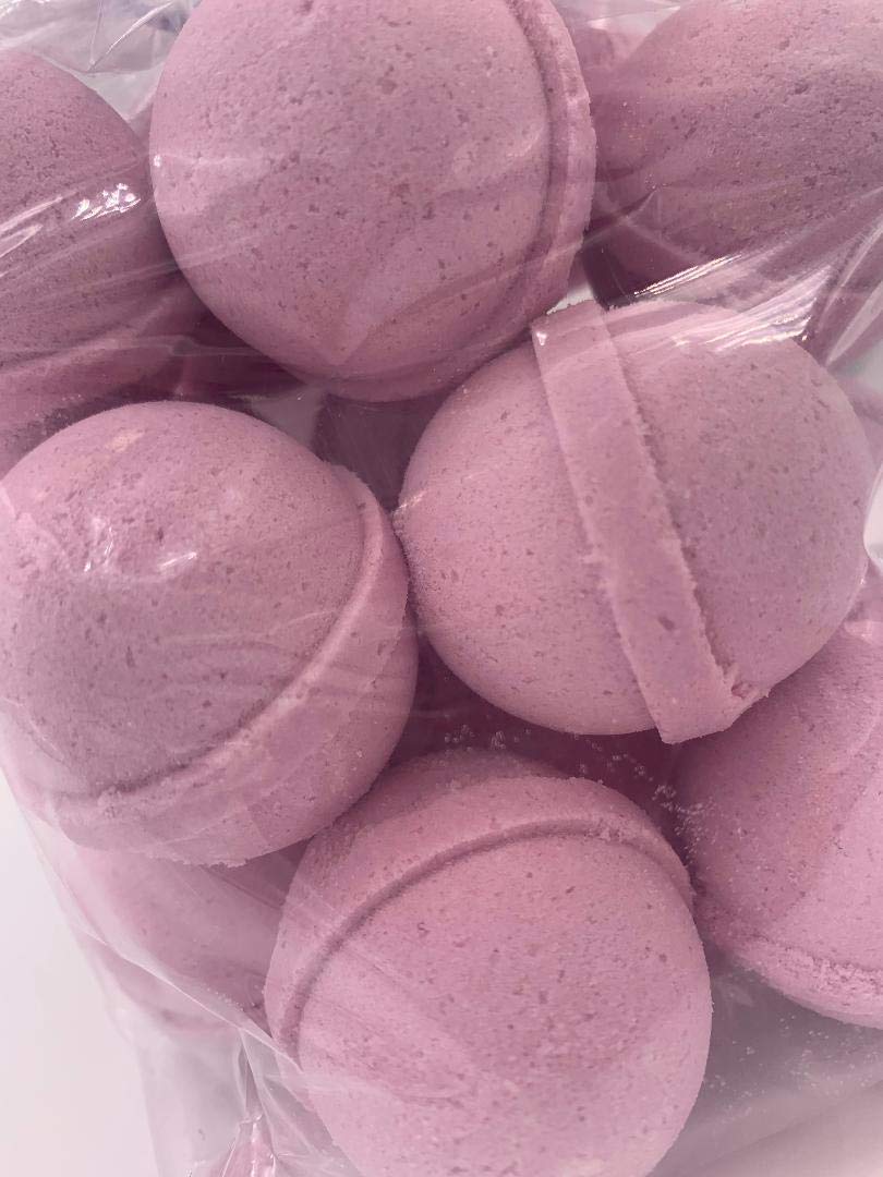 Spa Pure Juicee Couture Fizzies highlighting vegan ingredients and natural oils.