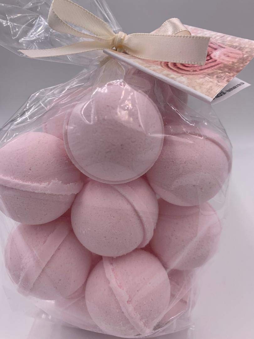 Spa Pure Pink Sugar Bath Bombs 14-pack on display, ideal for moisturizing dry skin.