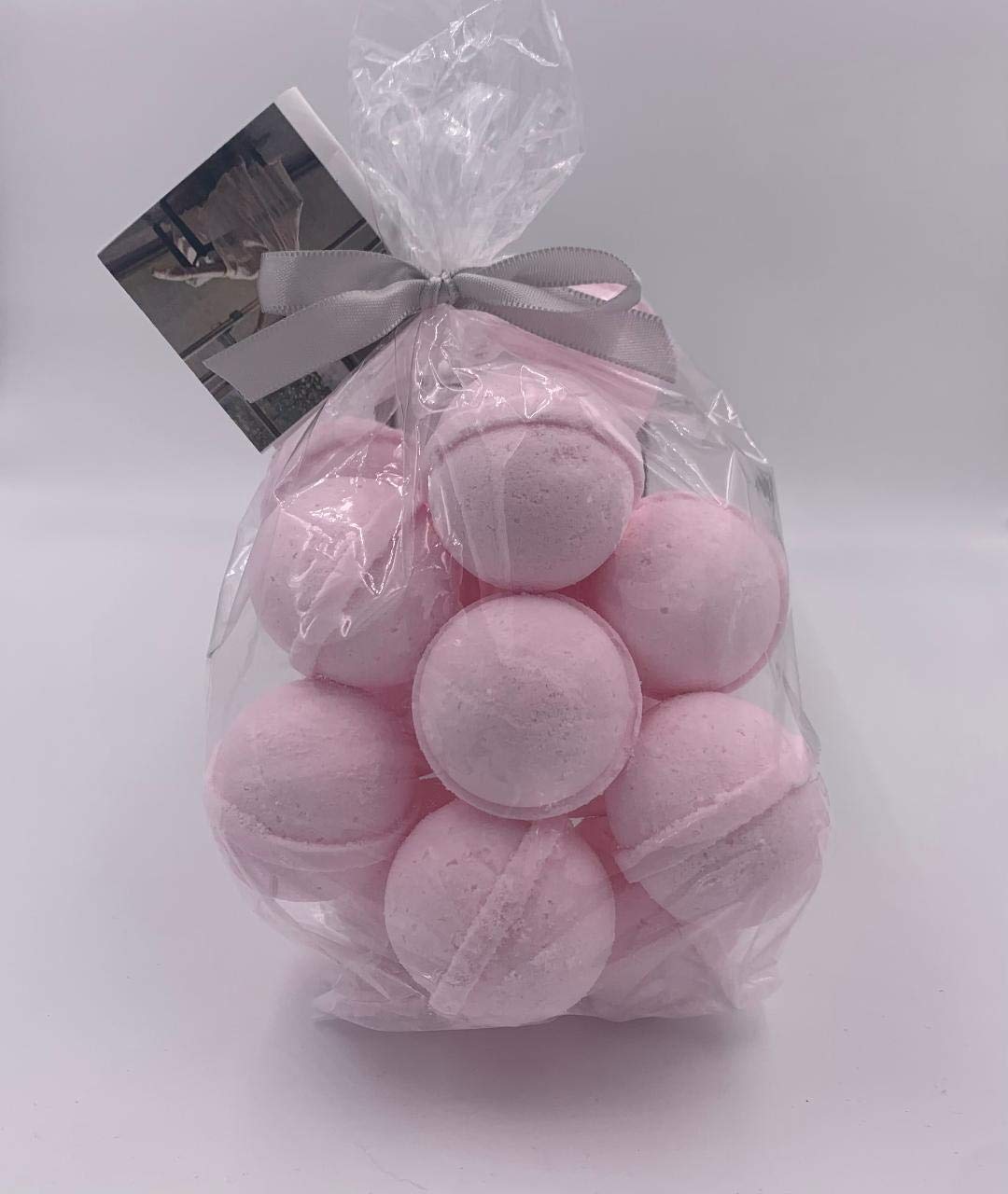 Spa Pure Pink Sugar Bath Bombs ingredients with cocoa, mango, and shea butter for nourishment.