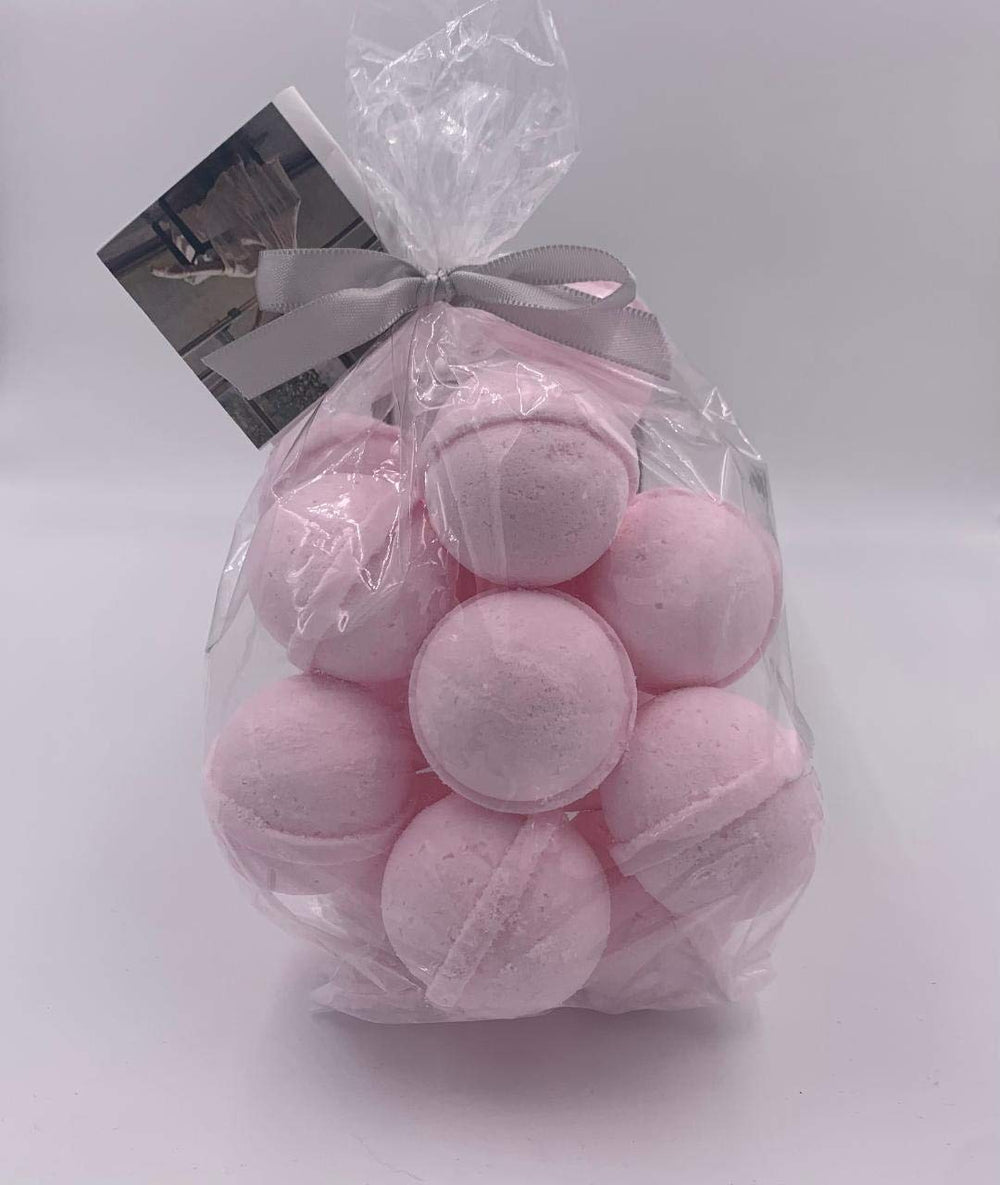 Spa Pure Pink Sugar Bath Bombs ingredients with cocoa, mango, and shea butter for nourishment.