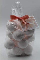 Spa Pure White Tea Ginger bath bomb with shea butter for moisturizing skin.
