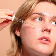 SpaLife 24K gold flakes closeup reveals luxe radiance and refined skin texture.