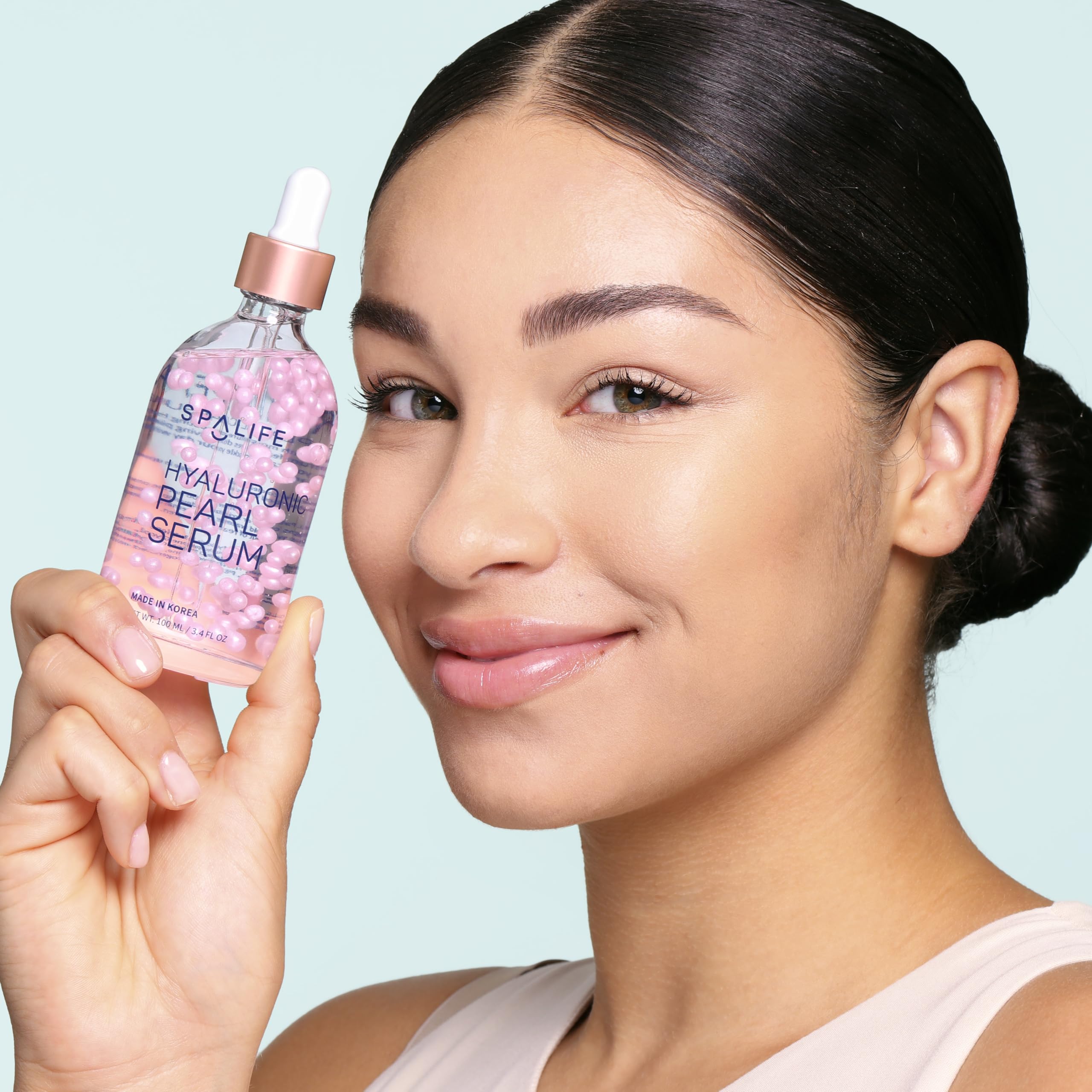SpaLife Hyaluronic Acid serum dropper highlights deep hydration for plump, healthy skin.