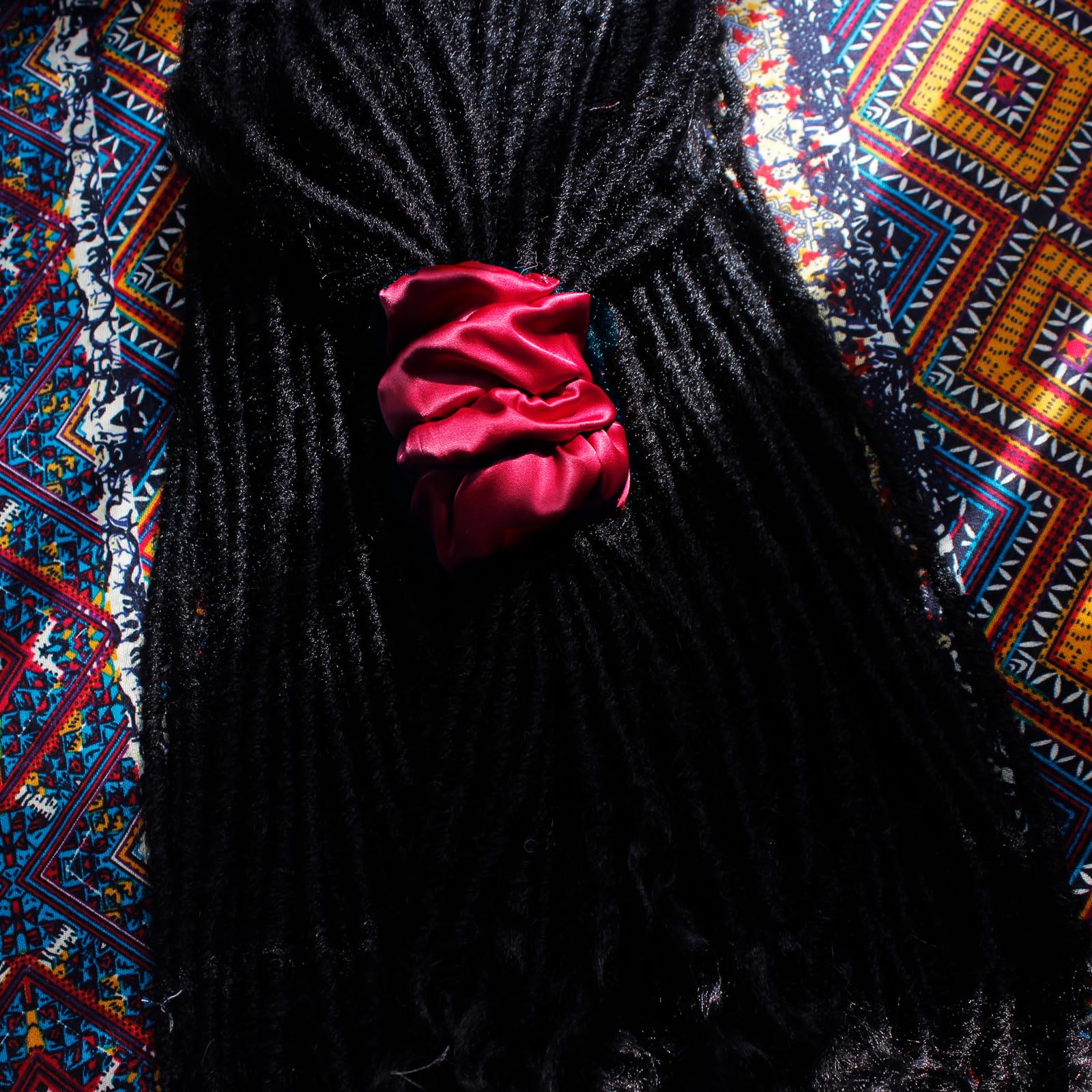 Spiral Lock Hair Tie extralarge shown on model with colorful options.