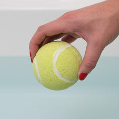 Sportigift eco-friendly can packaging with recycled, tennis-inspired presentation.