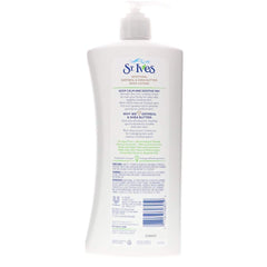 St. Ives body lotion application shows soothing moisture for dry skin.