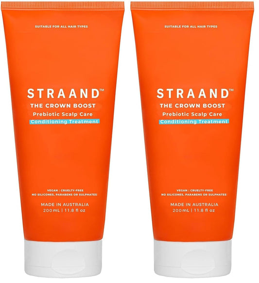 Straand Crown Boost bottle close-up showing hydrating conditioning action