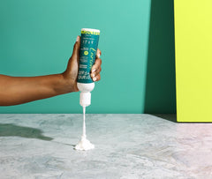 Strands of Faith Enrich Leave-In packaging displayed signaling moisture-rich care for textured hair.