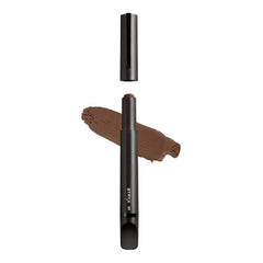 Stryx Concealer Stick Dark Eclipse applying for precise blemish coverage