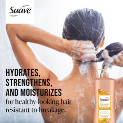 Foam from Suave Ceramide Age Brilliance Shampoo nourishes strands with gentle cleansing.