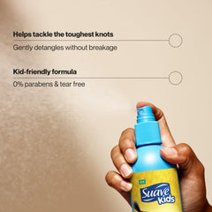 Suave Kids Detangler Spray spray-dispense action — gentle mist for easy combing.