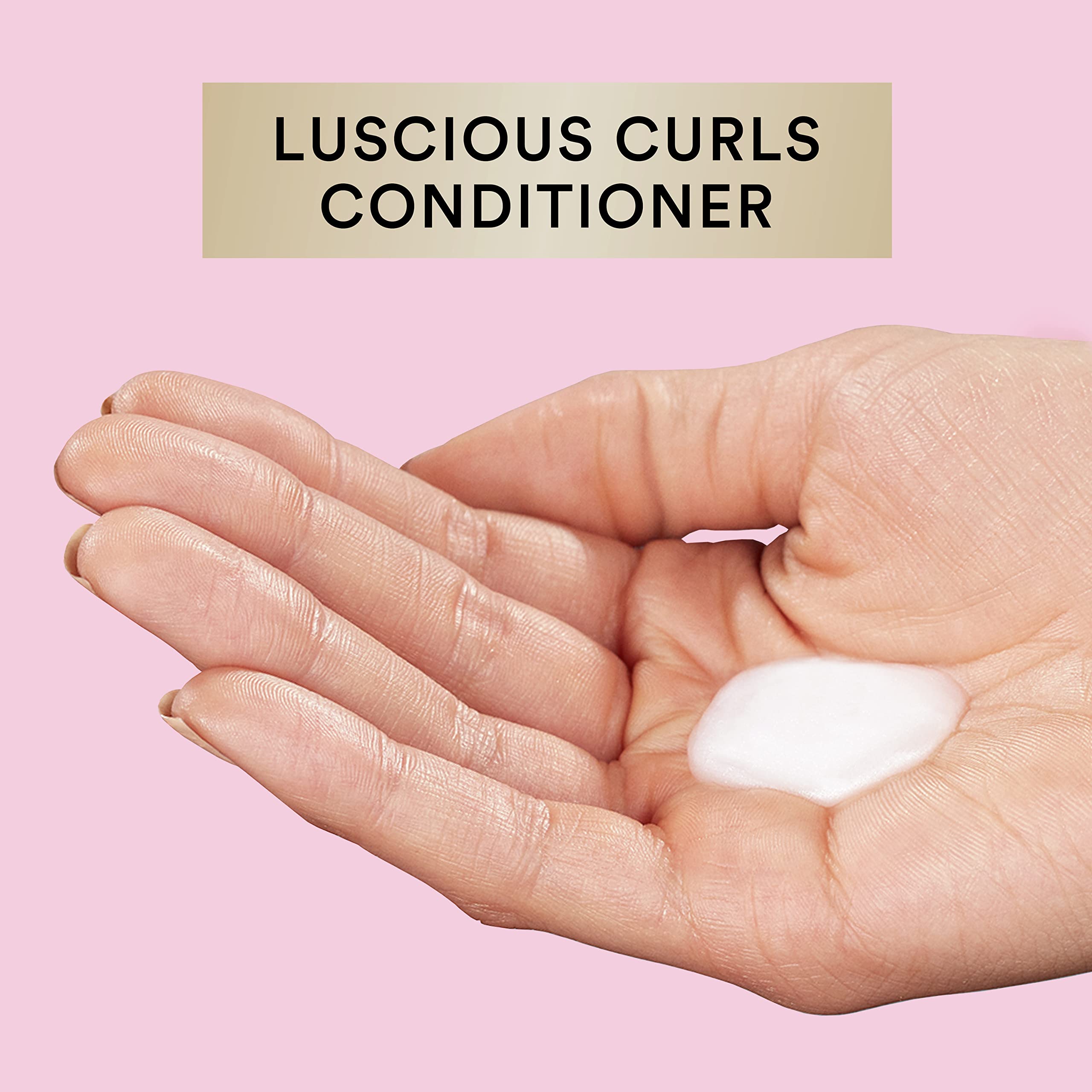 Suave Luscious Curls detangling action shown on tangled curls.
