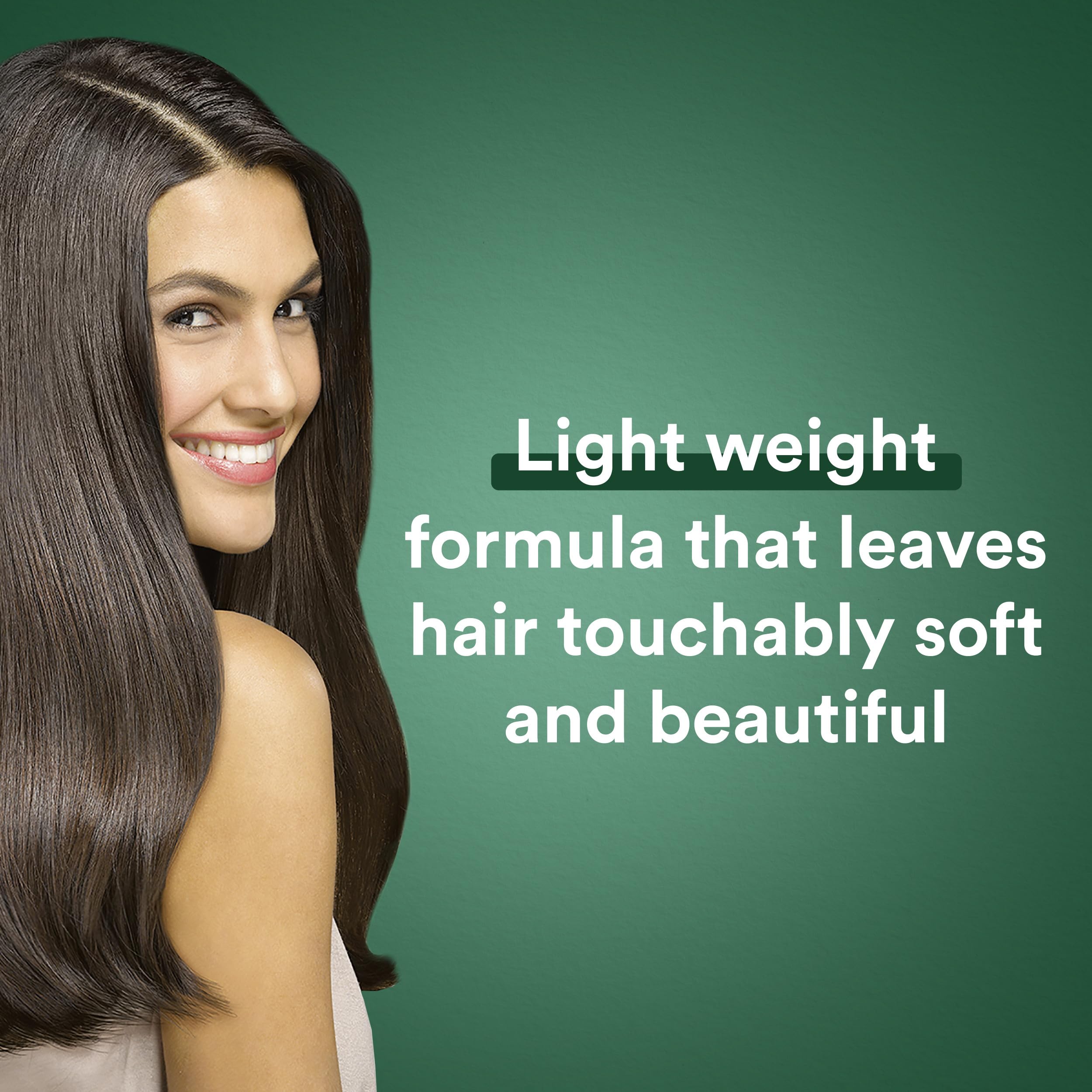 Suave Professionals Almond + Shea Butter Conditioner pump shows easy application.