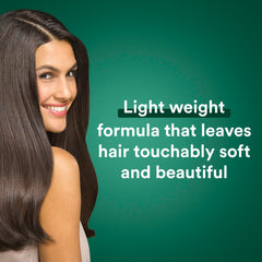 Suave Professionals Almond + Shea Butter Conditioner pump shows easy application.