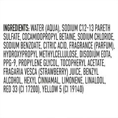 Close-up of strawberry extract in Suave shampoo formula highlighting natural fragrance