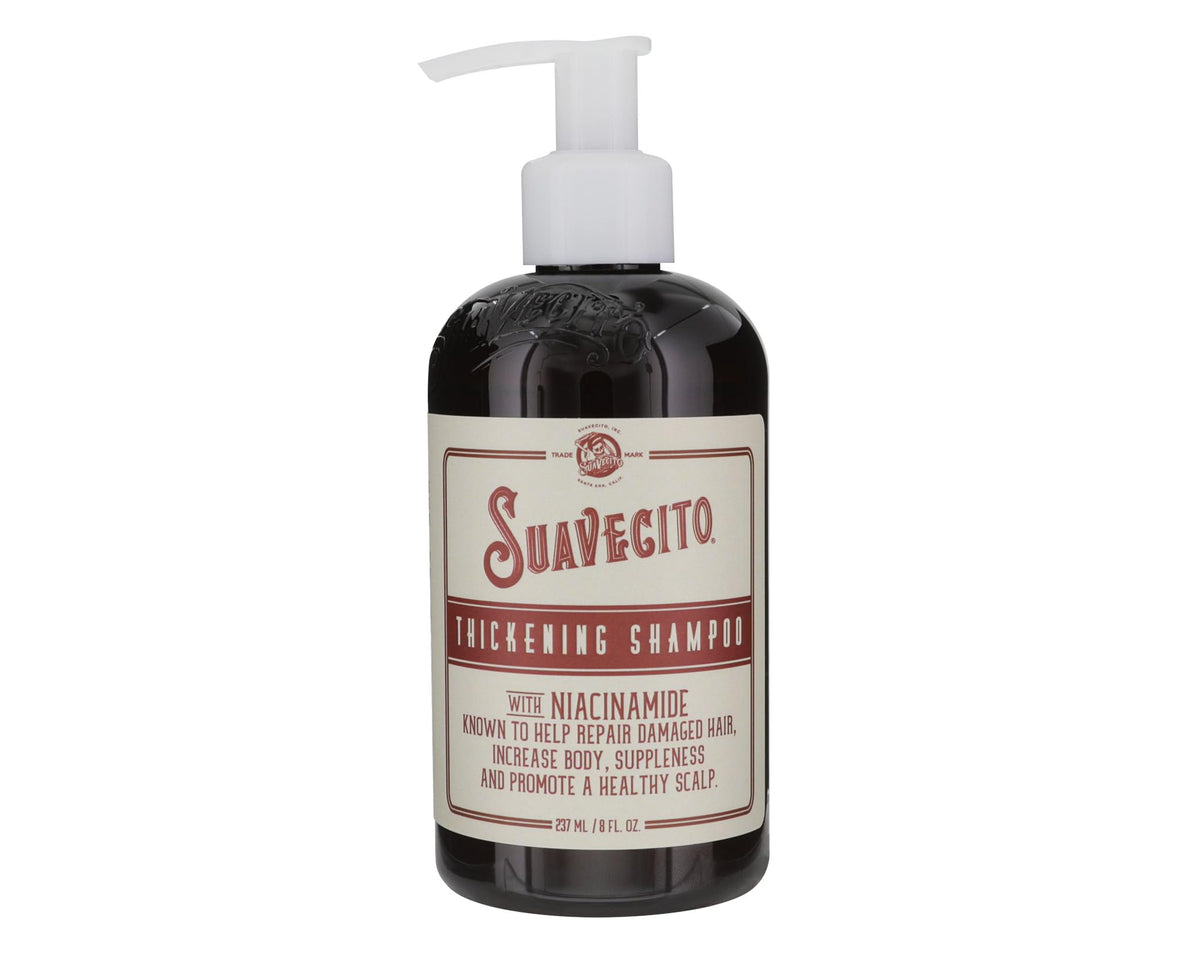 Suavecito Thickening Shampoo bottle shows Niacinamide for fuller-looking hair.