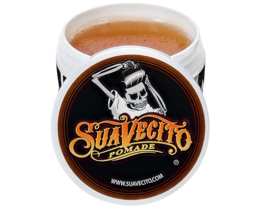Hands applying Suavecito Original Hold for quick grip and flexible control.